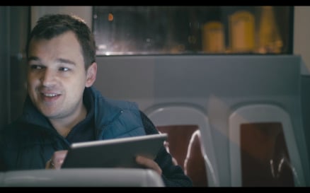 Smiling Man in the Bus With Tablet Computer - Stock Video