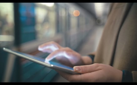 Woman Using Tablet PC by the Leaving Train in Subway - Stock Video