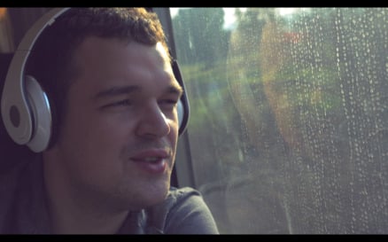 Man singing with music in train - Stock Video