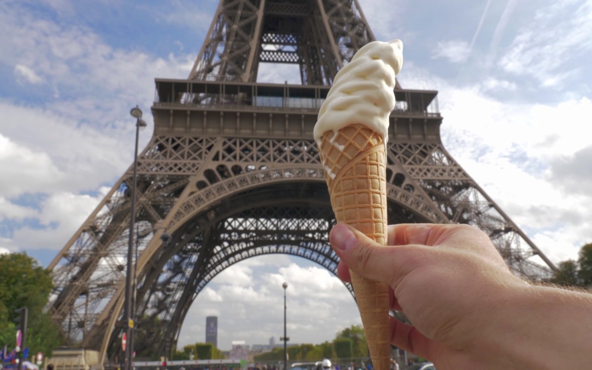 Soft serve ice cream and Eiffel Tower in Paris, France food Stock Video