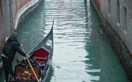 Veteran Gondolier Rowing Gondola along Water Canal in Venice, It vehicles - Stock Video
