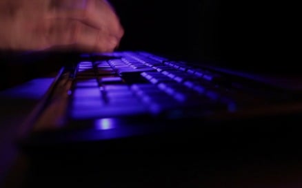 Man hands typing on the blue keyboard Time lapse technology - Stock Video