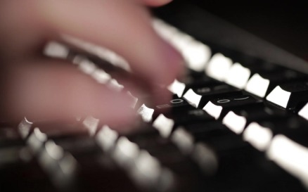 Woman is typing on the keyboard technology - Stock Video