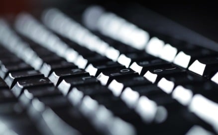 Typing on the keyboard at night technology - Stock Video