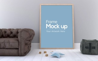 Kids Photo Frame Design Laying on Floor with Sofa product mockup