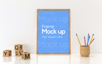 Kids Photo Frame Laying on Floor with Pencils product mockup