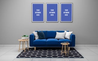 Blue sofa with empty photo frames mockup Living room interior design product mockup