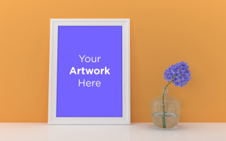 Empty photo frame mockup design with yellow wall and purple flower product mockup
