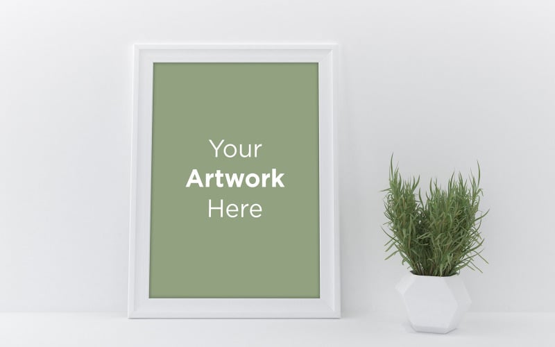 Empty white photo frame mockup with green grass in a geometric pot product mockup Product Mockup