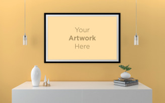 Landscape frame mockup on yellow wall with cabinet and hanging lights product mockup