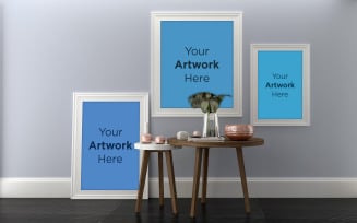 Three empty photo frame mockup with table on wooden floor product mockup