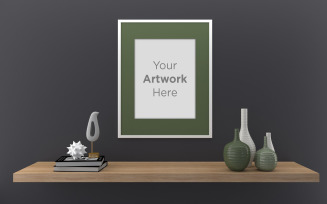 Vertical frame mockup with vases and books laying on shelf product mockup