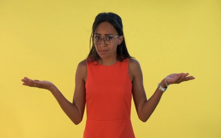 Mixed-race young woman spreading her hands to the sides - video footage Stock Video