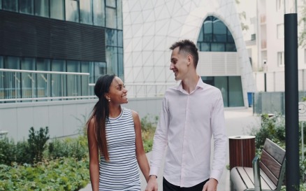 Happy multiracial couple having date in modern city - video footage Stock Video