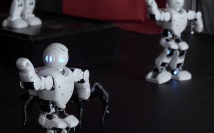 Humanoid Robots With Colourful Illumination Dancing - Stock Video