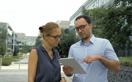 Business People Talking Outside With Electronic Stock Video