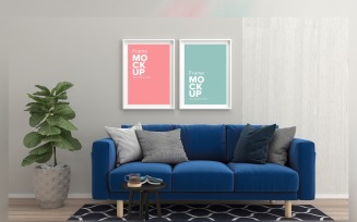 Blue Sofa With Cushions In A Living Room With A Two Frame Mockup, Houseplant