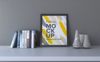 Black Frame Mockup With Vases And Books On A Gray Wall Mockup Template
