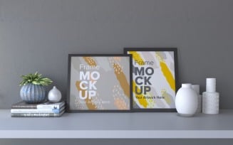 Frames With Decorative Items On A Gray Wall Mockup Template