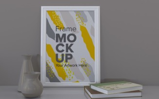 White Frame With Vases And Books On The Shelf Mockup Template