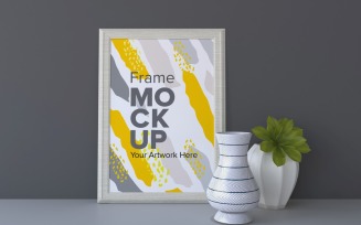 White Frame With Vases On A Gray Wall Background Mockup Template