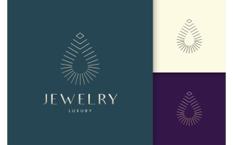 Beauty or spa logo in luxury gold shape