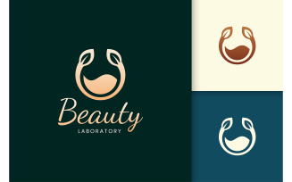 Perfume spray logo in gold for beauty