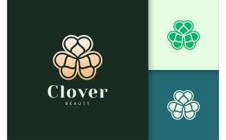 Clover Leaf Logo in Luxury Gold Color with Green Color