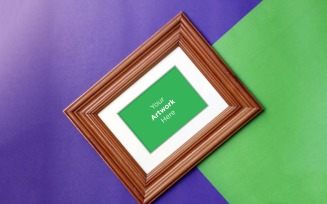 Horizontal Wooden Frame Mockup with Purple and Green Color paper Background Mockup template