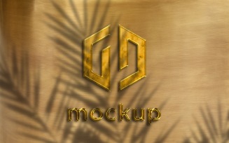 Golden Logo Mockup With Leaves Shadow Effects
