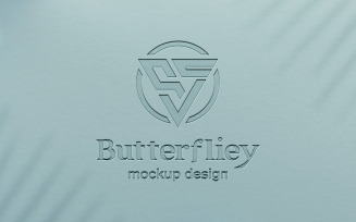 Debossed Cyan Logo on Paper Texture Background Mockup