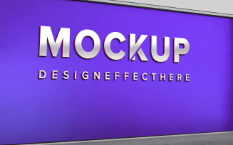 Metallic Logo Mockup on Purple Company Wall