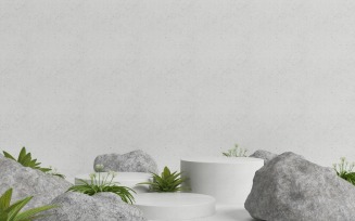 Podium with gray rock and plants for product presentation