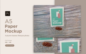 A5 Paper Mockups With Conifer cone and craftel bowl on Wooden background