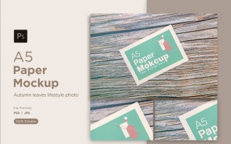 A5 paper mockup on wooden background