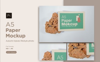 A5 Paper Mockups With Brown stones on whit background