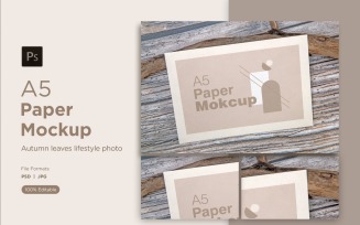 A5 Paper Mockups With wood on Wooden background