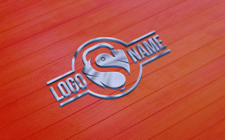 Metal logo mockup on blue 3d effect with red texture background
