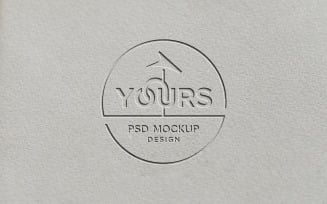 Realistic logo mockup on gray paper with debossed effect
