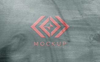 Pink logo mock up with a gray paper texture background