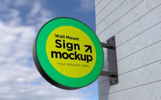 Round Wall Mount Sign Mockup Template attached to the wall 16A