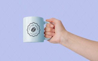 Hand holding mug logo mockup for promotional branding