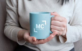 Mug with changeable colors and logo mockups held by female hands