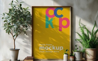 Poster Frame Mockup with decorative items on the table 05