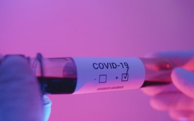 Doctor looking at a COVID-19 test tube analysis in the lab - Stock Video