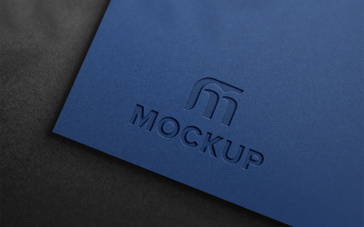 Makieta luksusowego logo na niebieskim papierze