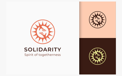 Logotipo de caridade ou doação na mão e sol