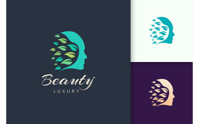 Logo de beauté avec logo visage et feuille