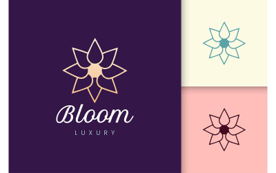 Logo piękna w kształcie luksusowego kwiatu