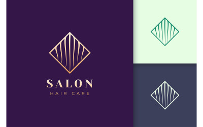 Modèle de logo de coupe de cheveux en forme de luxe